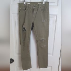Gap 1969 distressed olive green skinny jeans.